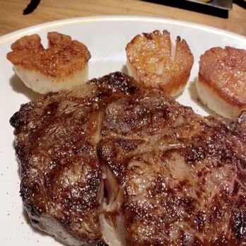 Baldamar - 18 oz. Prime Rib Eye, Seared Scallops, King Crab - New American Near Me - Roseville, Minnesota Baldamar - 18 oz. Prime Rib Eye, Seared Scallops, King Crab - New American Near Me - Roseville, Minnesota