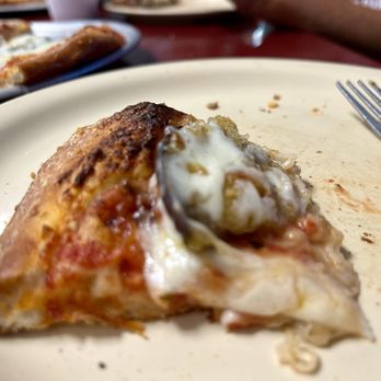 Antonio's - My last bite of Eggplant pizza - Italian Near Me - East Palatka, Florida