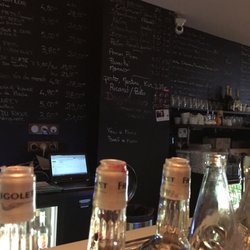 O2 - Wine card written on the wall! Not just 1 or 2 wines. Lots of them are sold by the glass.