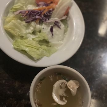 Samurai's Japanese Steakhouse - a bowl of soup and a plate of salad - Japanese Near Me - Spanaway, Washington Samurai's Japanese Steakhouse - a bowl of soup and a plate of salad - Japanese Near Me - Spanaway, Washington