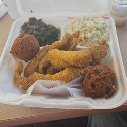 Sportsman Fish & Grill - 3 piece catfish dinner (even though they slid me 5 pieces) with slaw, hush puppies and mustard greens