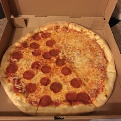 Roma's Pizza & Restaurant - Here's our large half-pepperoni pizza we ordered after an evening out Black Friday shopping!