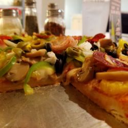 Joe's Pizza - Toppings on top of cheese. Piled high.