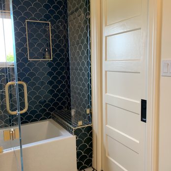 Habitat Renovations - Shower with tub and bench, pocket door installation, niche with two levels, heated tile floor - General Contractors Near Me - San Francisco, California Habitat Renovations - Shower with tub and bench, pocket door installation, niche with two levels, heated tile floor - General Contractors Near Me - San Francisco, California