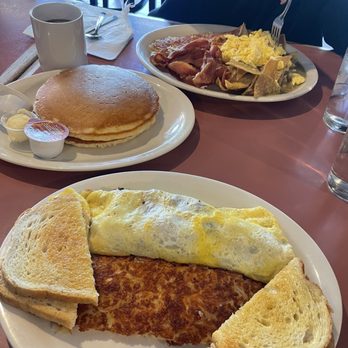 Doug's Place - (Front): Omelette w/hash brows (Middle): Short Stack Pancakes (Back): Chilaquiles w/bacon - Breakfast & Brunch Near Me - Castro Valley, California