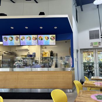Poké + Go - You can see the bowl images and the confusing menu on glass - Poke Near Me - Miami, Florida Poké + Go - You can see the bowl images and the confusing menu on glass - Poke Near Me - Miami, Florida