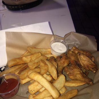 Mic Drop Social - 6/pieces Spicy Lemon Pepper wings with fries... - Dance Clubs Near Me - Missouri City, Texas