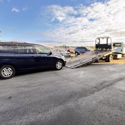 A Better Towing - Tow truck loading van