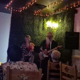 Mark and Debbie singing/strumming a tune