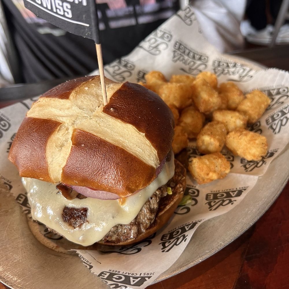 Ford's Garage Oviedo - Mushroom and Swiss burger and tots - Burgers Near Me - Oviedo, Florida Ford's Garage Oviedo - Mushroom and Swiss burger and tots - Burgers Near Me - Oviedo, Florida