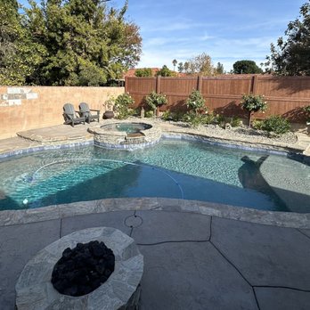 Swan Pools West - a pool in the backyard - Landscaping Near Me