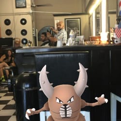 Oak Street Barber Shop - I found out there's a Pokestop here too so I'm having fun for a while. Come in for the cut, stay for the Pokemon.