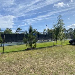 Parking by the pickleball courts.