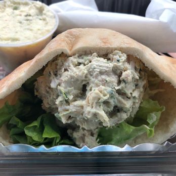 Claras Tidbits Restaurant & Catering - Chicken salad pita sandwich with potato salad as a side. - American Near Me - Jacksonville, Florida Claras Tidbits Restaurant & Catering - Chicken salad pita sandwich with potato salad as a side. - American Near Me - Jacksonville, Florida