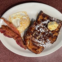Sunny Side Up - This place was amazing! The waitstaff was super friendly! I got the french toast sandwich but the omelettes looked amazing!