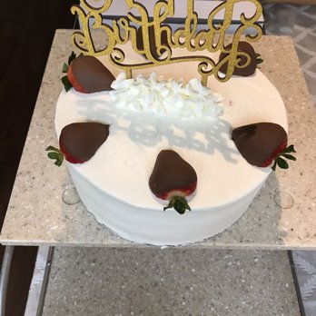 Delicias - a birthday cake with strawberries on top - Desserts Near Me Delicias - a birthday cake with strawberries on top - Desserts Near Me