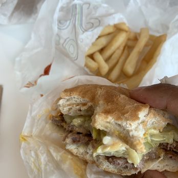 Billy Goat Tavern - Double cheeseburger with pickles, mustard, mayo & ketchup. Also half the fries. We were starving so I forgot to take a before picture. - Burgers Near Me - Chicago, Illinois