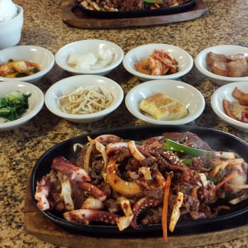 Korean Grill - Seafood and beef bulgogi on a sizzling platter. - Korean Near Me - Austin, Texas Korean Grill - Seafood and beef bulgogi on a sizzling platter. - Korean Near Me - Austin, Texas