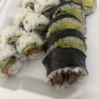 Roll & Grill - Eel roll (left), salmon roll (right) - Japanese Near Me - Fullerton, California Roll & Grill - Eel roll (left), salmon roll (right) - Japanese Near Me - Fullerton, California