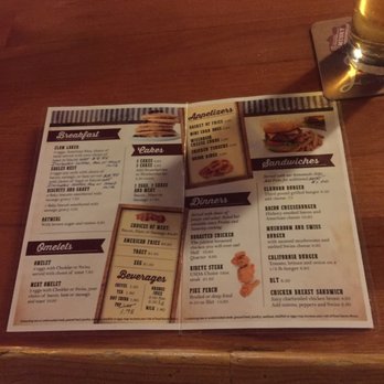 Elkhorn Lodge - a menu and a glass of wine - Bars Near Me - Clam Lake, Wisconsin