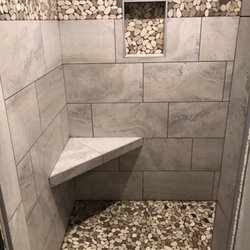 Spokane Tile - Shower with rock designs!