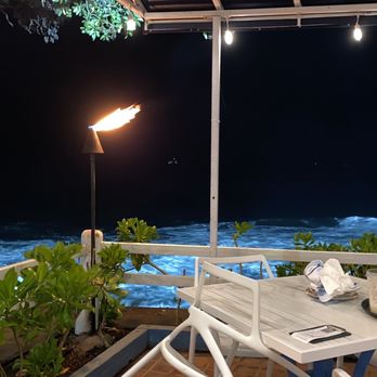 Kai Eats + Drinks - View from outdoor deck seating at night. - Tacos Near Me - Kailua-Kona, Hawaii