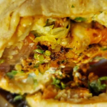 Azteca Taco Truck - The Al Pastor burrito hit the spot, creamy/sloppy goodness. - Food Trucks Near Me - Milwaukee, Wisconsin