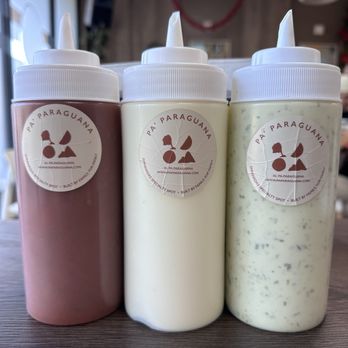 Pa' Paraguana - Hot sauce (more smoky than heat), garlic sauce, cilantro sauce. - Empanadas Near Me - Kissimmee, Florida Pa' Paraguana - Hot sauce (more smoky than heat), garlic sauce, cilantro sauce. - Empanadas Near Me - Kissimmee, Florida