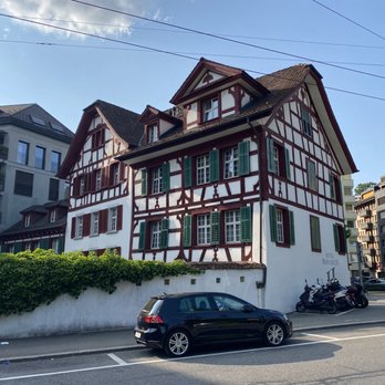 Hotel Hofgarten - Exterior of restaurant with walled garden outdoor patio - Restaurants Near Me - Luzern, LU Hotel Hofgarten - Exterior of restaurant with walled garden outdoor patio - Restaurants Near Me - Luzern, LU