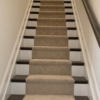 Ackaway Floor Coverings - a person walking up the stairs - Carpeting Near Me - Paterson, New Jersey Ackaway Floor Coverings - a person walking up the stairs - Carpeting Near Me - Paterson, New Jersey