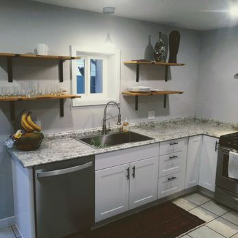 Round the Corner Handyman Service - Modern shelving and cabinetry in complete kitchen remodel in the Sante Fe neighborhood - Handyman Near Me Round the Corner Handyman Service - Modern shelving and cabinetry in complete kitchen remodel in the Sante Fe neighborhood - Handyman Near Me