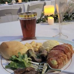 Kelly's Sugarthyme Catering - The flank steak with chimichurry, jalapeño cream cheese stuffed chicken breast bacon wrapped, jalapeño Mac and cheese, and mashed potatoes.