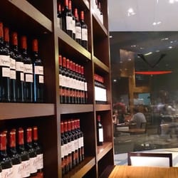 Vinitus - The wall of wine bottles.