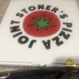 a white cake with a tomato on it a white cake with a tomato on it