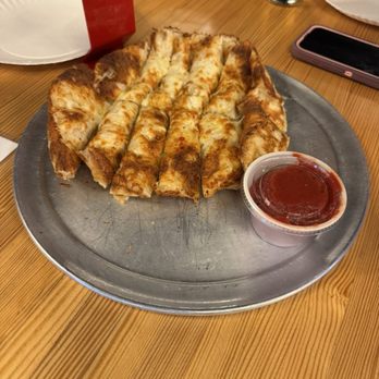 Aviator Pizza & Drafthouse - Focaccia breadsticks with marinara sauce for dipping - Pizza Near Me - Houston, Texas Aviator Pizza & Drafthouse - Focaccia breadsticks with marinara sauce for dipping - Pizza Near Me - Houston, Texas