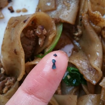 MaDee Thai Kitchen - I swear it's not black pepper or any other food. It's scraps from the pan. I'm not returning to thus place. - Thai Near Me - Costa Mesa, California