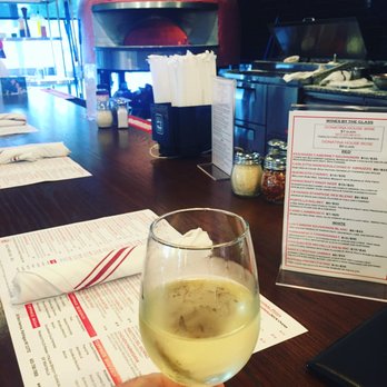 Donatina Neapolitan Pizza Cafe - Sipping a fruity glass of Santa Cristina Umbria at Patchogue’s Donatina Neapolitan. - Pizza Near Me - Patchogue, New York Donatina Neapolitan Pizza Cafe - Sipping a fruity glass of Santa Cristina Umbria at Patchogue’s Donatina Neapolitan. - Pizza Near Me - Patchogue, New York