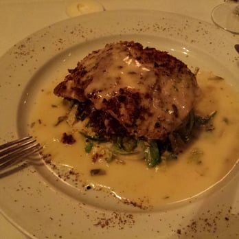 Zov's - Almond crusted Sea bass lying on a bed of red quinoa cake. This is from Zov's Bistro side...not the bakery, btw. - Mediterranean Near Me - Tustin, California Zov's - Almond crusted Sea bass lying on a bed of red quinoa cake. This is from Zov's Bistro side...not the bakery, btw. - Mediterranean Near Me - Tustin, California