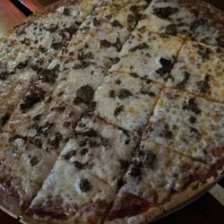 Coach’s Bar & Grill - Large sausage pizza
