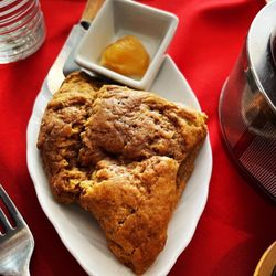 TeaLee's Teahouse & Bookstore - My homemade pumpkin scone served warm with a dollop of lemon curd! Yummy