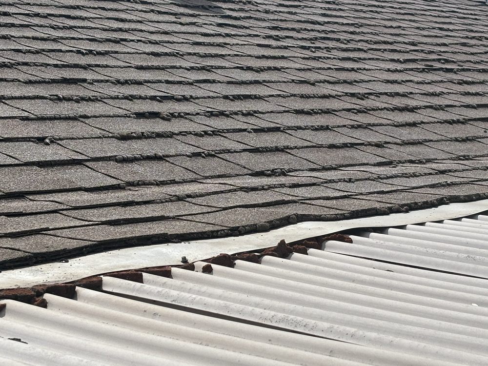 Slide of John Stahl Roofing