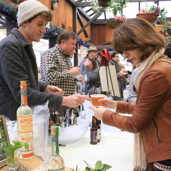 Good Food Awards - a man handing a glass of wine to a woman - Farmers Market Near Me - San Francisco, California Good Food Awards - a man handing a glass of wine to a woman - Farmers Market Near Me - San Francisco, California