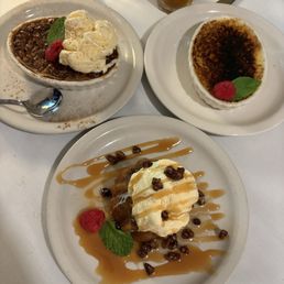 HOMEMADE desserts of Bourbon pecan pie, crème brûlée, and rum cake with ice cream & caramel drizzle were AMAZING HOMEMADE desserts of Bourbon pecan pie, crème brûlée, and rum cake with ice cream & caramel drizzle were AMAZING