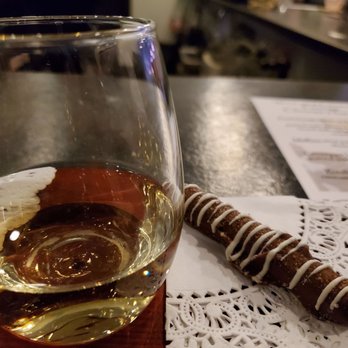 Mucciolo Family Wines - a glass of wine and a cigar - Wine Tasting Room Near Me - Old Forge, Pennsylvania