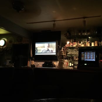 T K Bittermans - a television in a dimly lit bar - Dive Bars Near Me - Houston, Texas T K Bittermans - a television in a dimly lit bar - Dive Bars Near Me - Houston, Texas