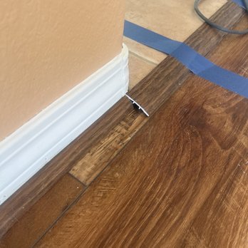 Floors Etc - The transition from the new floor to our tile. - Flooring Near Me - Las Vegas, Nevada Floors Etc - The transition from the new floor to our tile. - Flooring Near Me - Las Vegas, Nevada