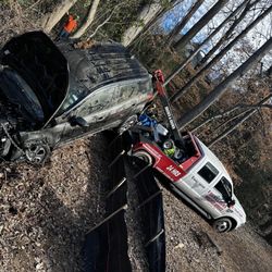 Brown & Brown Wrecker Service - Look how they pull it out of the pond!!!!!
