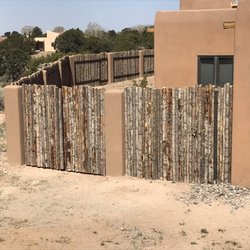 High Country Fencing & Walls - Coyote and pillars in Eldorado