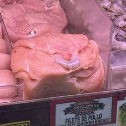 Raw shrimp on raw chicken