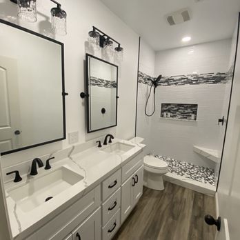 Moonhill Construction - a bathroom with a shower, sink, and toilet - General Contractors Near Me Moonhill Construction - a bathroom with a shower, sink, and toilet - General Contractors Near Me
